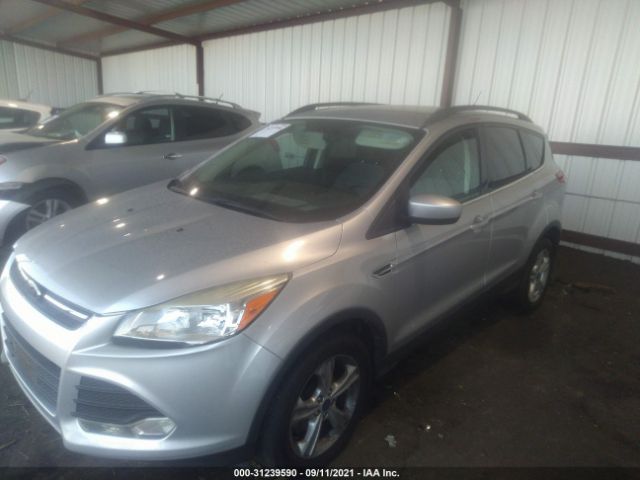 Photo 1 VIN: 1FMCU0GX0EUB64865 - FORD ESCAPE 