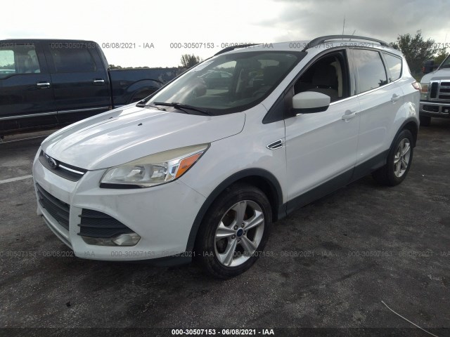 Photo 1 VIN: 1FMCU0GX0EUE01550 - FORD ESCAPE FWD 4C 