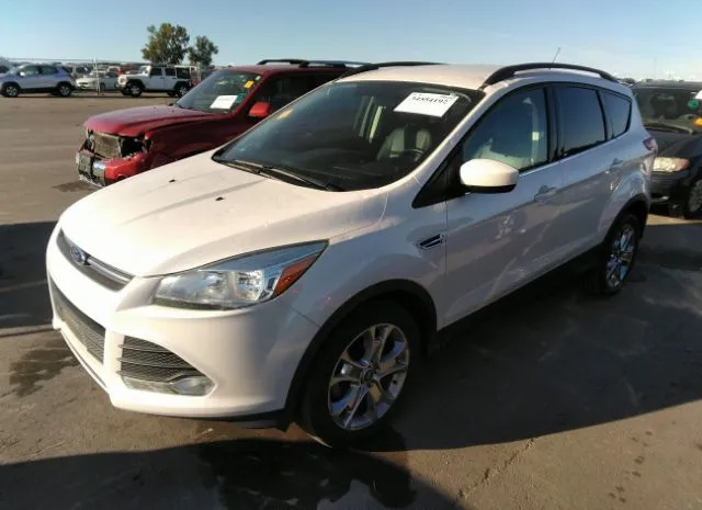 Photo 1 VIN: 1FMCU0GX3GUB56889 - FORD ESCAPE 