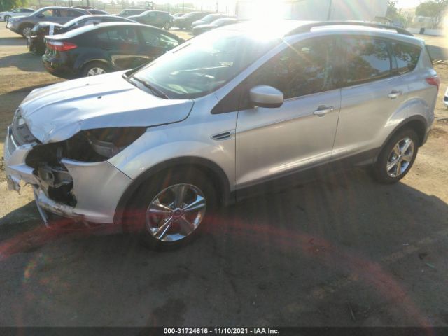 Photo 1 VIN: 1FMCU0GX4EUB64030 - FORD ESCAPE 