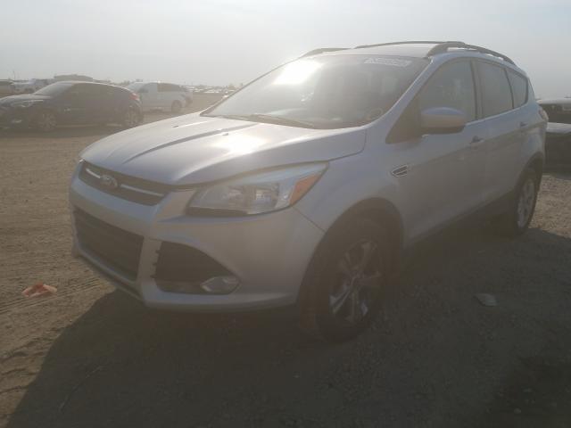 Photo 1 VIN: 1FMCU0GX5EUA50599 - FORD ESCAPE 