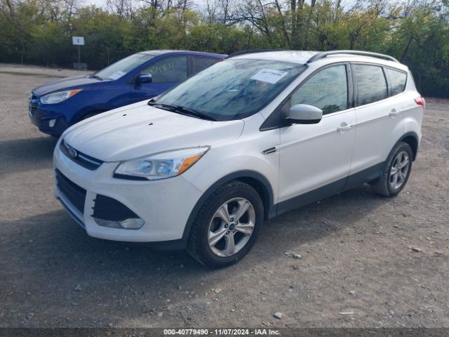 Photo 1 VIN: 1FMCU0GX5GUB69711 - FORD ESCAPE 