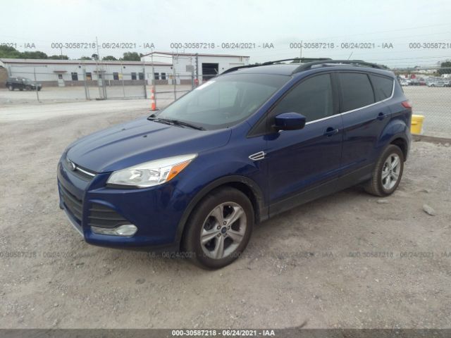 Photo 1 VIN: 1FMCU0GX6EUB79810 - FORD ESCAPE 