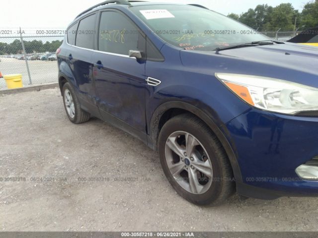 Photo 5 VIN: 1FMCU0GX6EUB79810 - FORD ESCAPE 