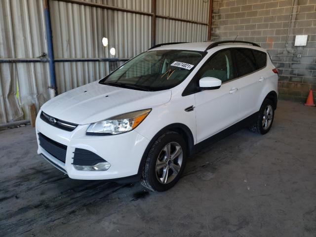 Photo 1 VIN: 1FMCU0GX6EUC39231 - FORD ESCAPE SE 