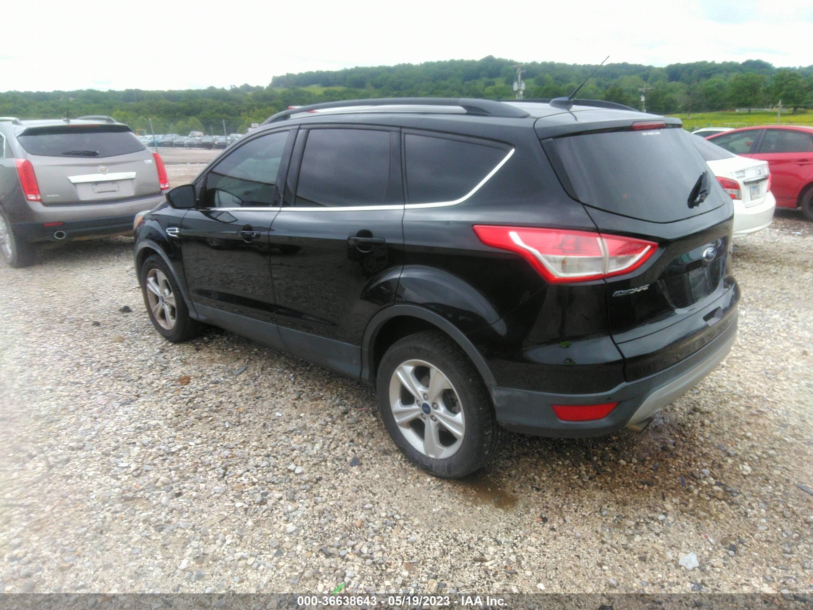 Photo 2 VIN: 1FMCU0GX7GUB57009 - FORD ESCAPE 