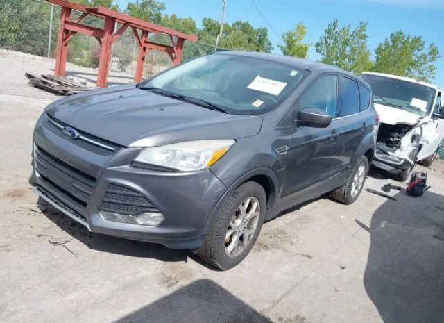 Photo 1 VIN: 1FMCU0GX8DUB72856 - FORD ESCAPE 