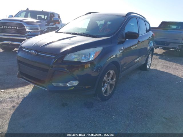 Photo 1 VIN: 1FMCU0GX8GUA49563 - FORD ESCAPE 