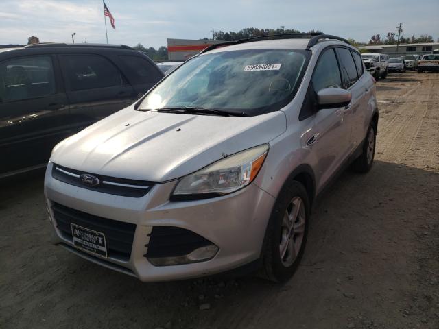 Photo 1 VIN: 1FMCU0GX9DUA13778 - FORD ESCAPE SE 