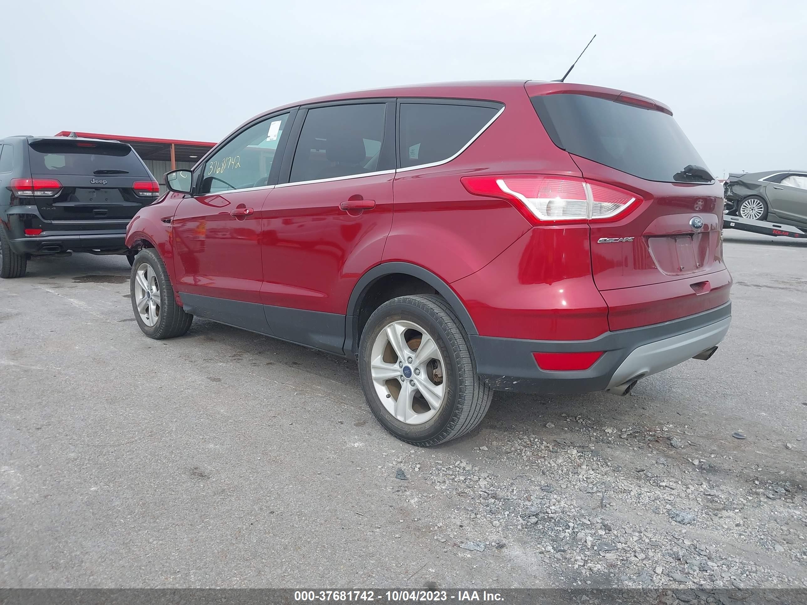 Photo 2 VIN: 1FMCU0GX9EUC36663 - FORD ESCAPE 