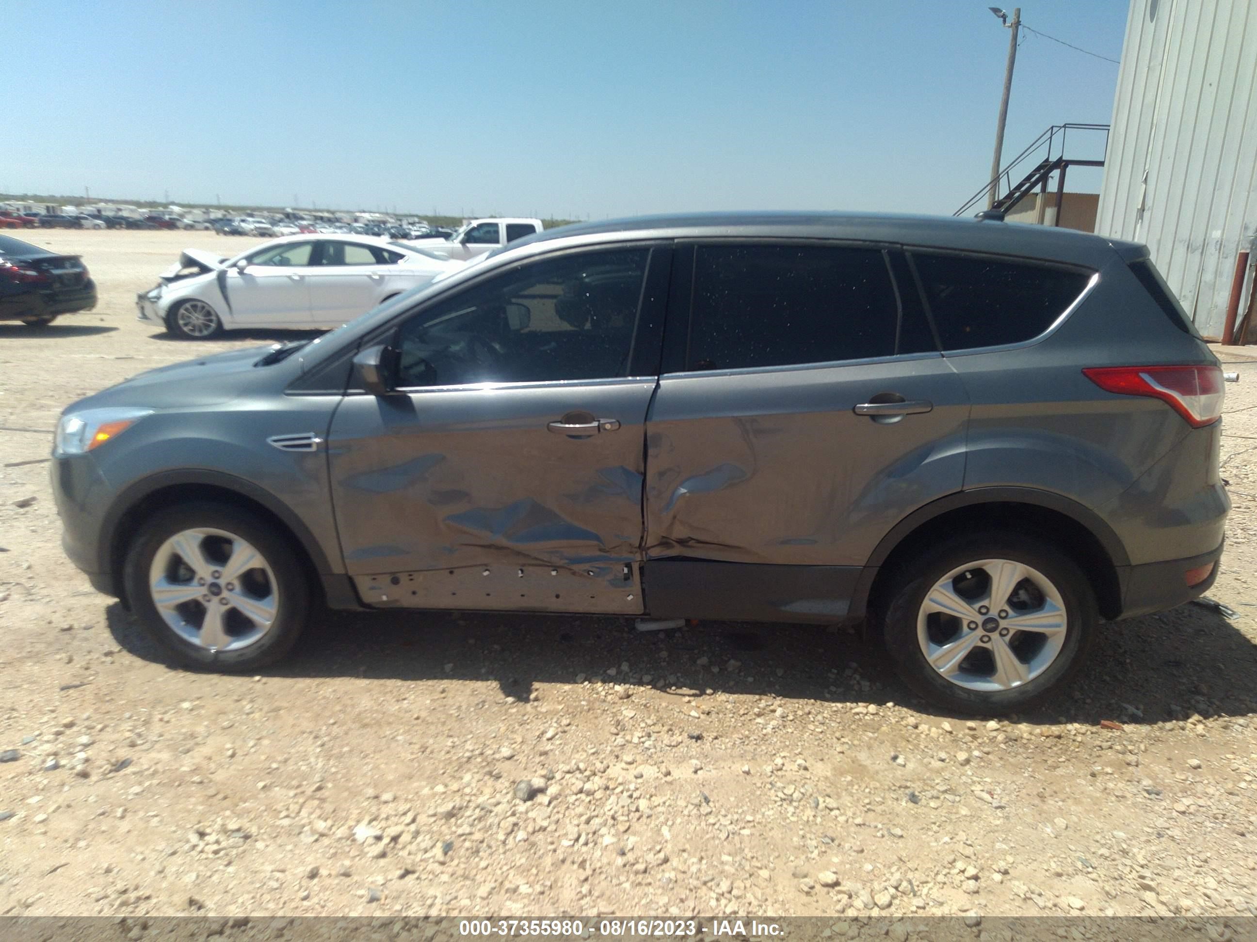 Photo 14 VIN: 1FMCU0GX9EUD58522 - FORD ESCAPE 