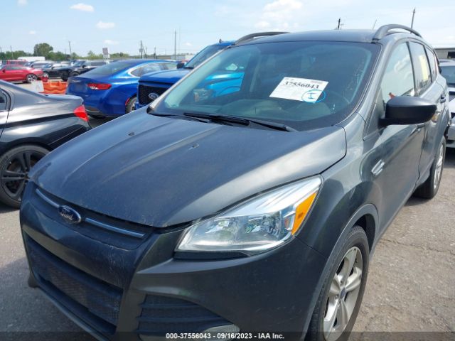 Photo 1 VIN: 1FMCU0GX9GUB70991 - FORD ESCAPE 