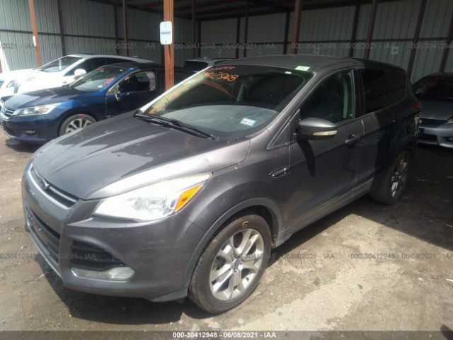 Photo 1 VIN: 1FMCU0H91DUD18627 - FORD ESCAPE 