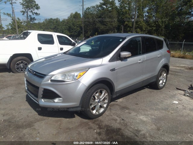 Photo 1 VIN: 1FMCU0H99DUA30743 - FORD ESCAPE 