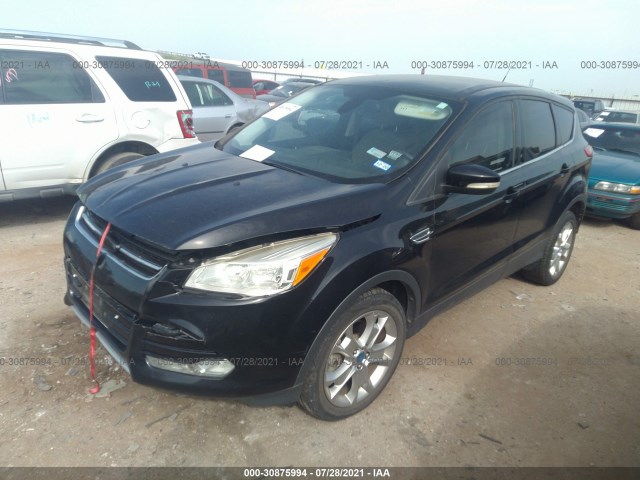 Photo 1 VIN: 1FMCU0H99DUB39266 - FORD ESCAPE 