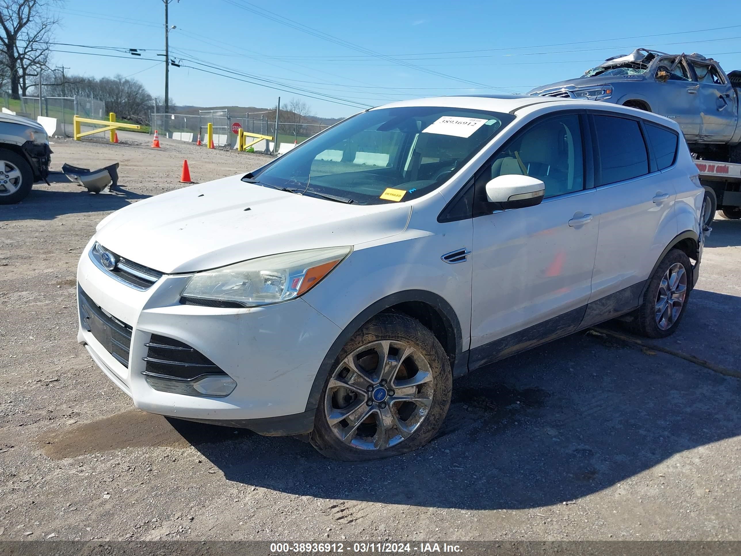 Photo 1 VIN: 1FMCU0H99DUB69674 - FORD ESCAPE 