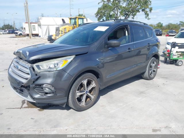 Photo 1 VIN: 1FMCU0HD9JUA61037 - FORD ESCAPE 