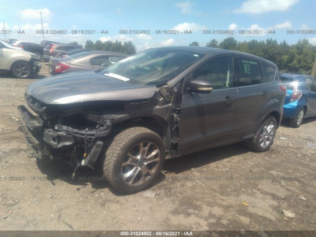 Photo 1 VIN: 1FMCU0HX0DUB70078 - FORD ESCAPE 