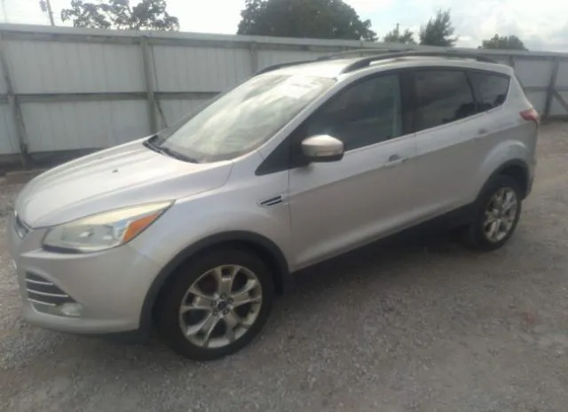 Photo 1 VIN: 1FMCU0HX2DUD03990 - FORD ESCAPE 