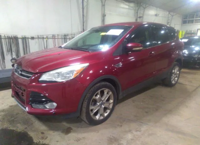 Photo 1 VIN: 1FMCU0HX3DUB76277 - FORD ESCAPE 