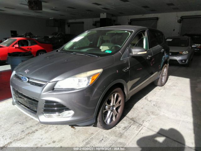 Photo 1 VIN: 1FMCU0HX4DUB99180 - FORD ESCAPE 