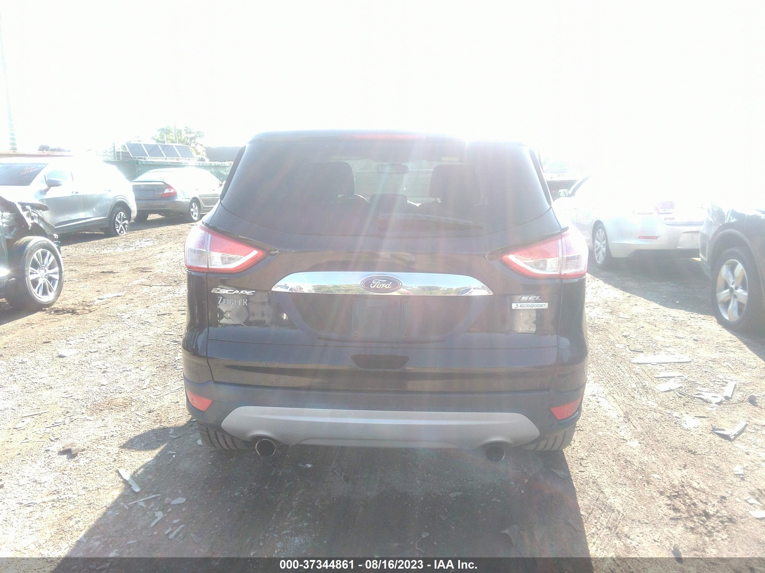 Photo 11 VIN: 1FMCU0HX4DUC85265 - FORD ESCAPE 