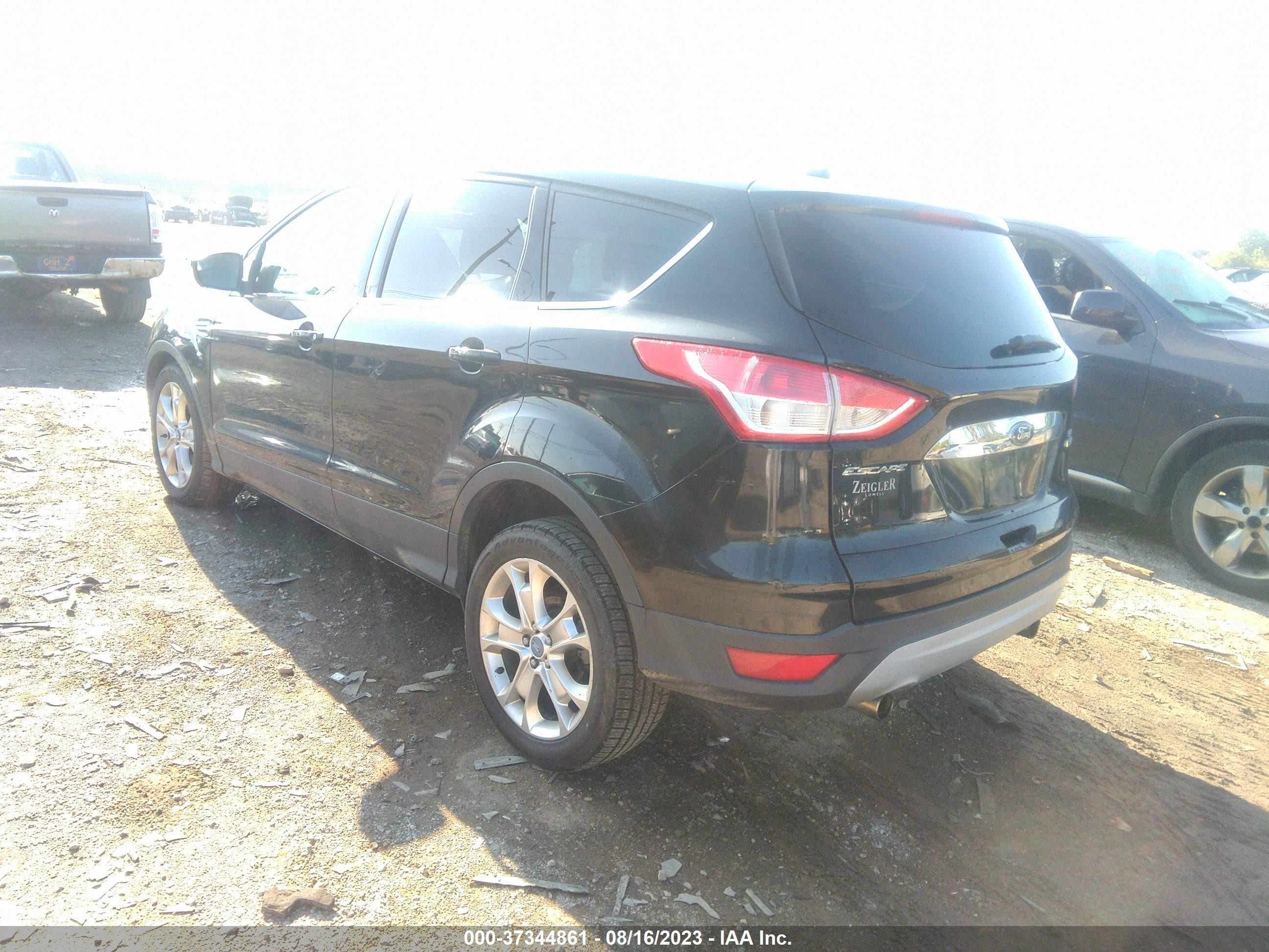 Photo 2 VIN: 1FMCU0HX4DUC85265 - FORD ESCAPE 