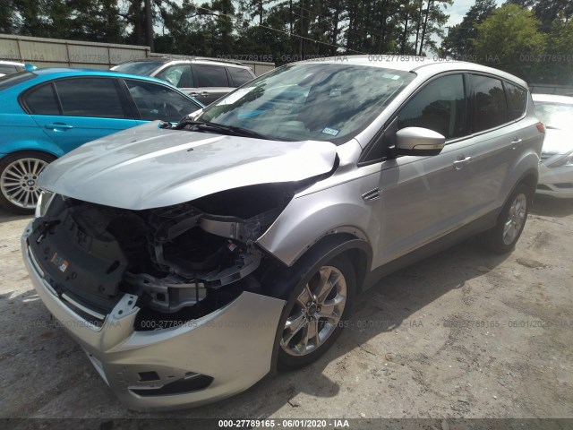 Photo 1 VIN: 1FMCU0HX4DUD23755 - FORD ESCAPE 