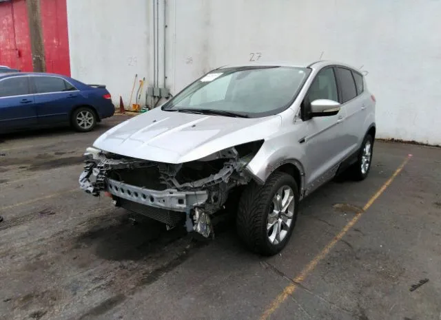 Photo 1 VIN: 1FMCU0HX6DUC48895 - FORD ESCAPE 