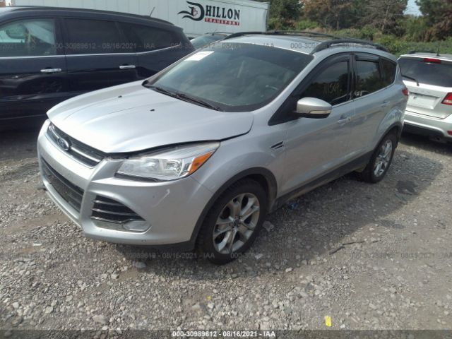 Photo 1 VIN: 1FMCU0HX9DUB12874 - FORD ESCAPE 