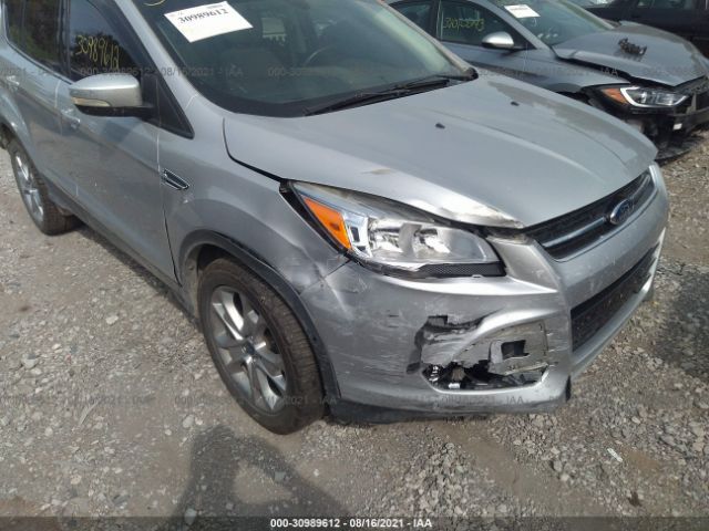 Photo 5 VIN: 1FMCU0HX9DUB12874 - FORD ESCAPE 