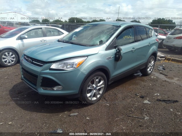 Photo 1 VIN: 1FMCU0HXXDUC69068 - FORD ESCAPE 