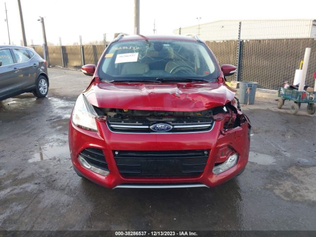 Photo 5 VIN: 1FMCU0J90EUB74001 - FORD ESCAPE 