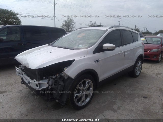 Photo 1 VIN: 1FMCU0JX2EUA69779 - FORD ESCAPE 