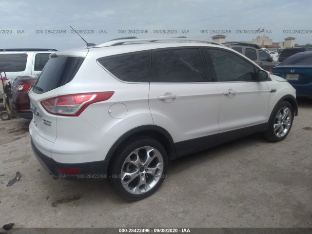 Photo 3 VIN: 1FMCU0JX2EUA69779 - FORD ESCAPE 