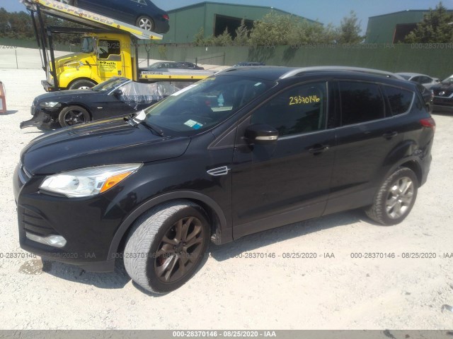 Photo 1 VIN: 1FMCU0JX4EUB33899 - FORD ESCAPE 