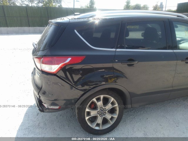 Photo 5 VIN: 1FMCU0JX4EUB33899 - FORD ESCAPE 