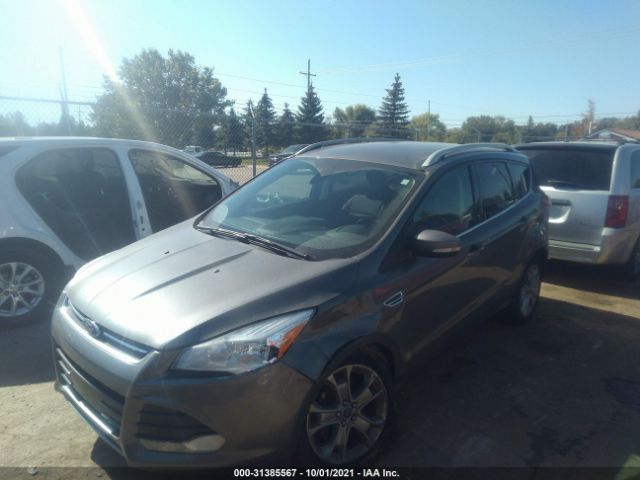 Photo 1 VIN: 1FMCU0JX6EUB59825 - FORD ESCAPE 