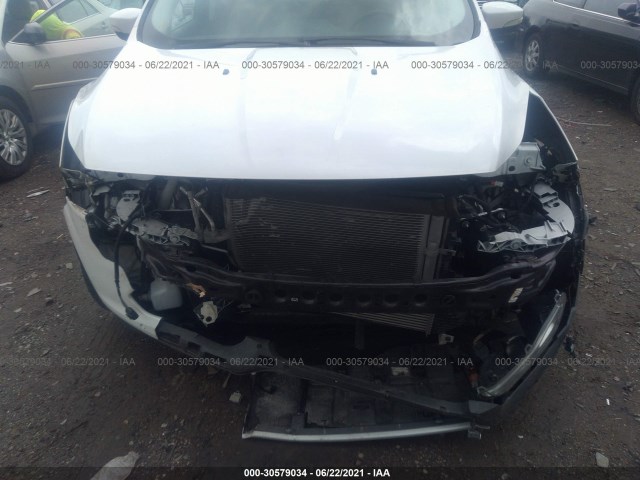 Photo 5 VIN: 1FMCU0JX7GUA35517 - FORD ESCAPE 