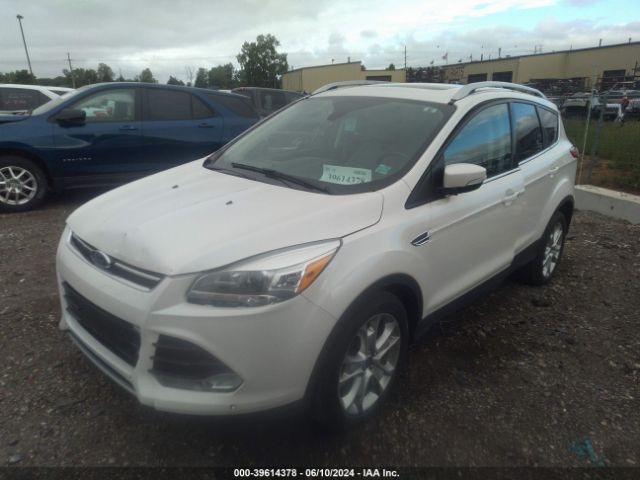 Photo 1 VIN: 1FMCU0JXXGUB34994 - FORD ESCAPE 