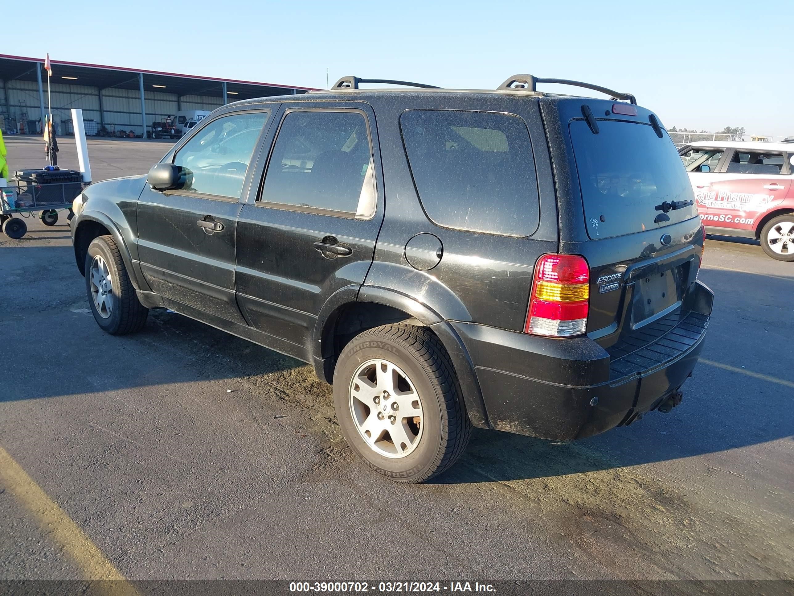 Photo 2 VIN: 1FMCU94145KB08542 - FORD ESCAPE 