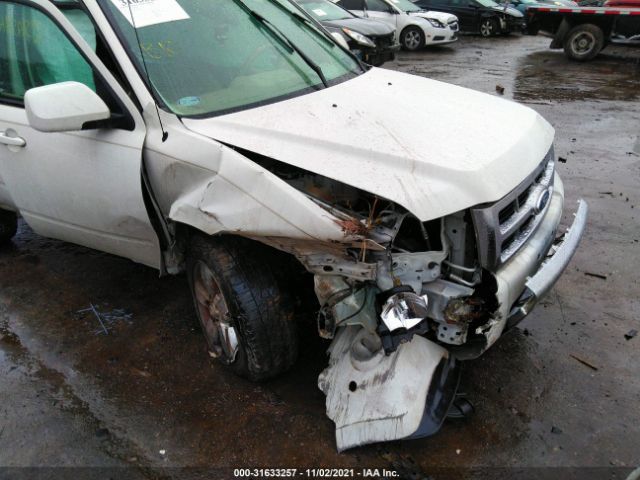 Photo 5 VIN: 1FMCU9EG8CKB28860 - FORD ESCAPE 