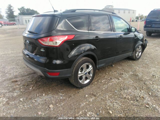 Photo 3 VIN: 1FMCU9G92EUB04009 - FORD ESCAPE 