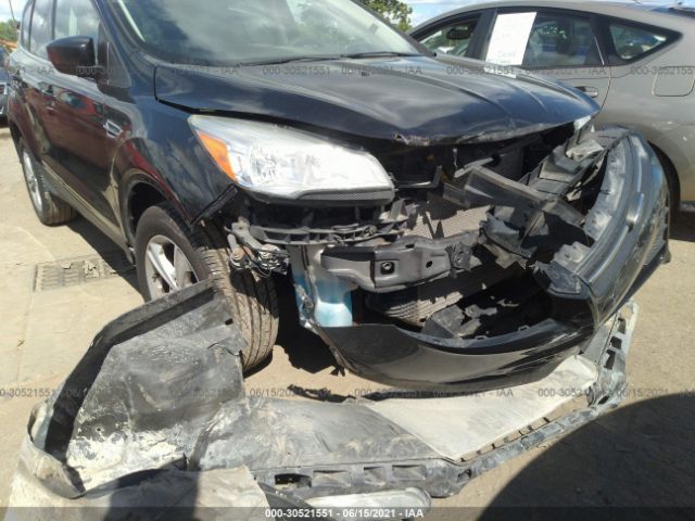 Photo 5 VIN: 1FMCU9G93EUB82508 - FORD ESCAPE 