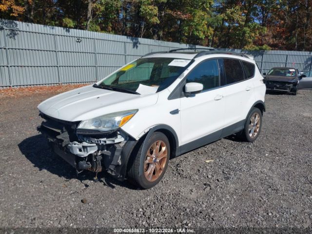 Photo 1 VIN: 1FMCU9G93GUB18844 - FORD ESCAPE 