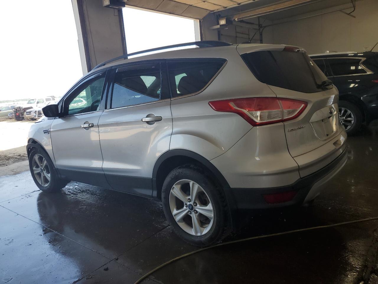 Photo 1 VIN: 1FMCU9G95EUC69410 - FORD ESCAPE 