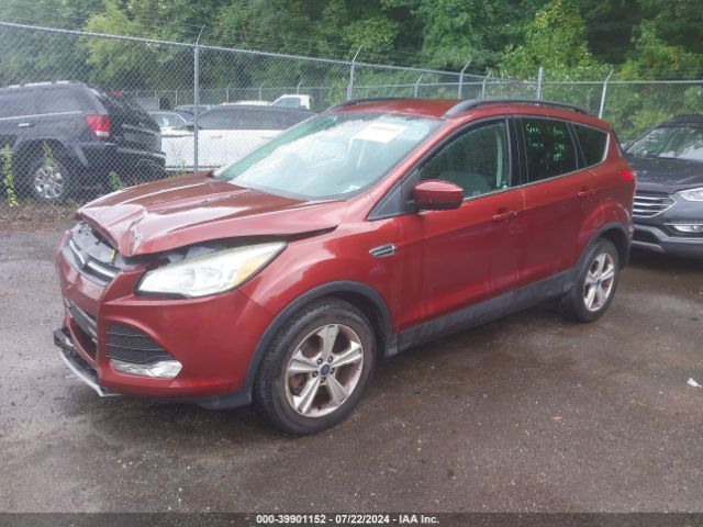 Photo 1 VIN: 1FMCU9G99GUB31663 - FORD ESCAPE 