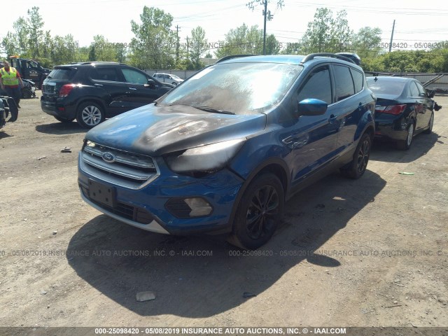 Photo 1 VIN: 1FMCU9GD1JUB15646 - FORD ESCAPE 