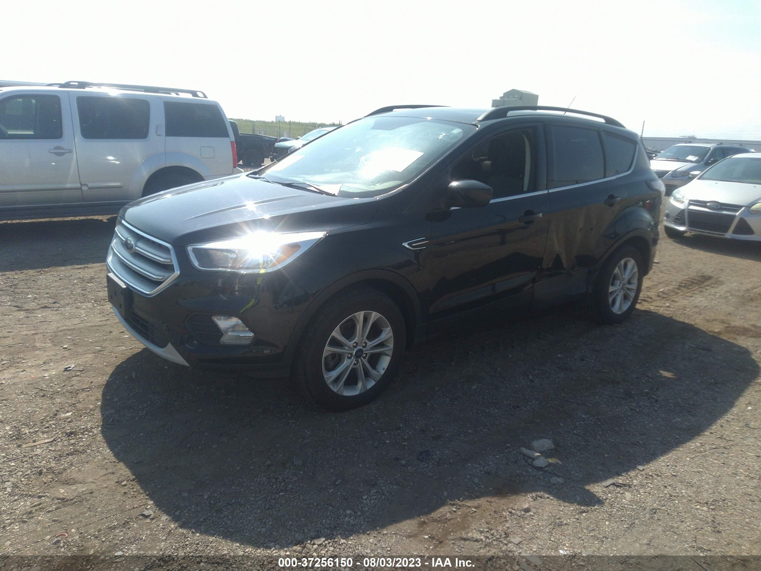 Photo 1 VIN: 1FMCU9GD6JUC40805 - FORD ESCAPE 