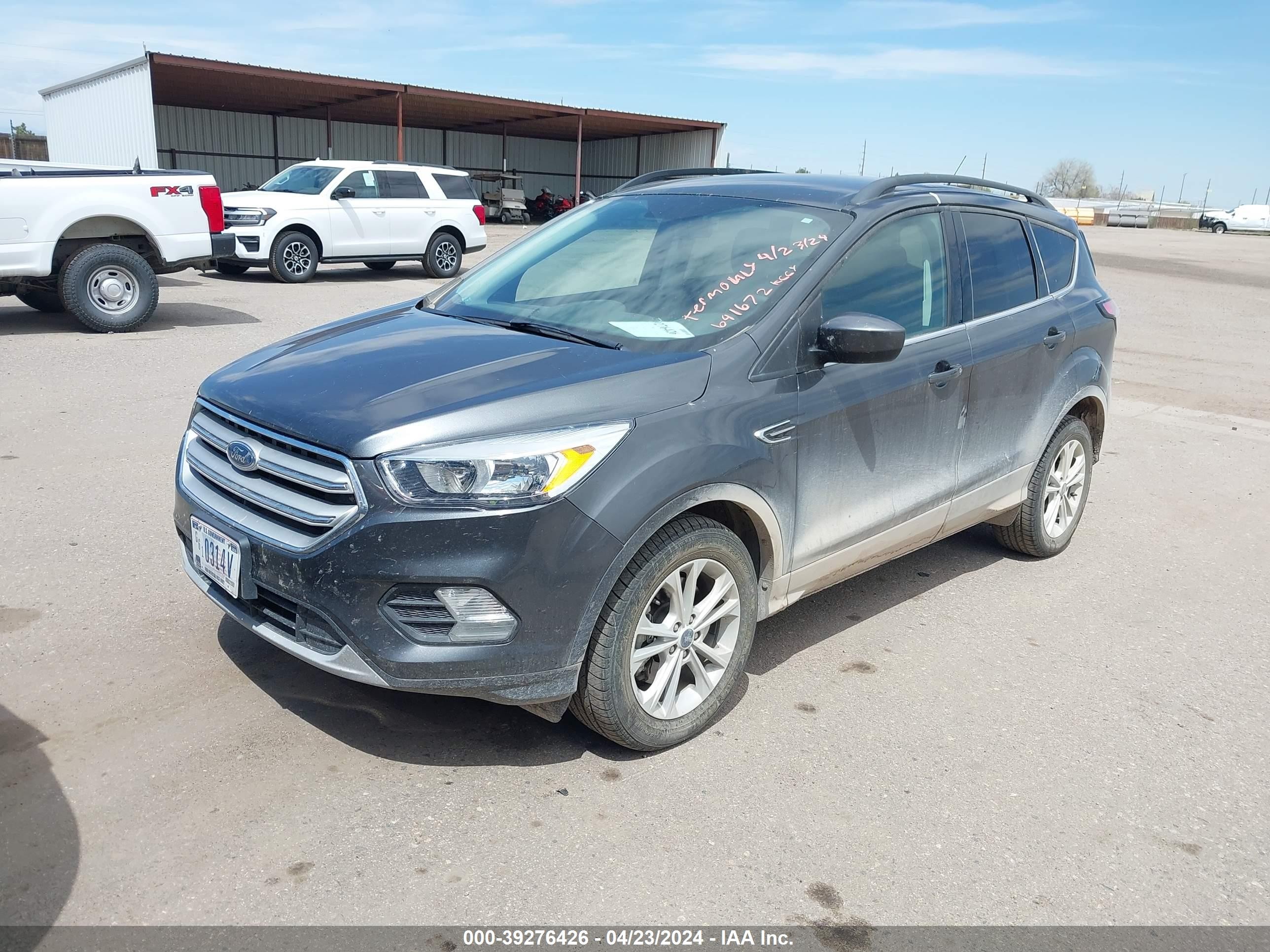 Photo 1 VIN: 1FMCU9GD8JUD31039 - FORD ESCAPE 